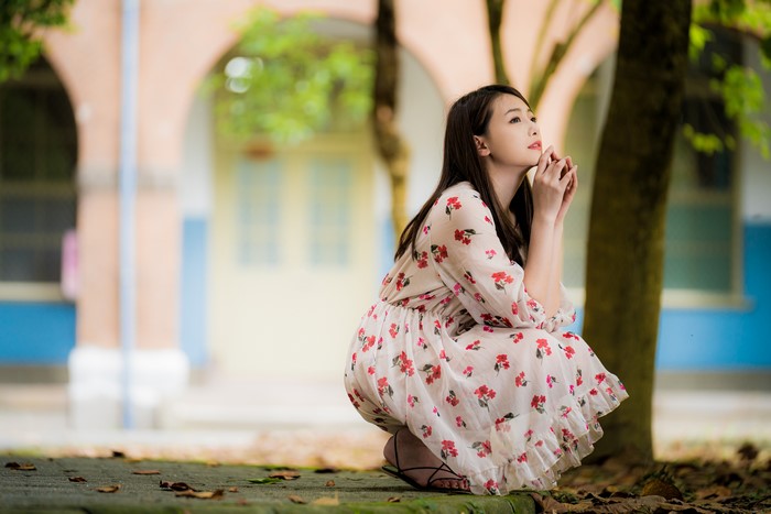 4K Asian Woman Sitting in Floral Dress