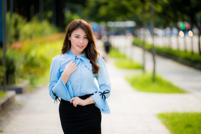 4K Asian Woman in Blue Blouse and Skirt