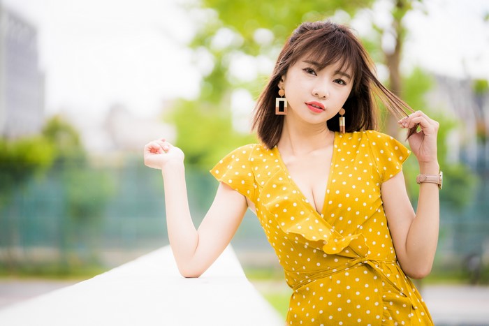 4K Asian Woman in Yellow Polka Dot Dress