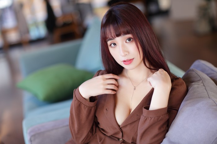 4K Asian Woman with Brown Hair and Bokeh