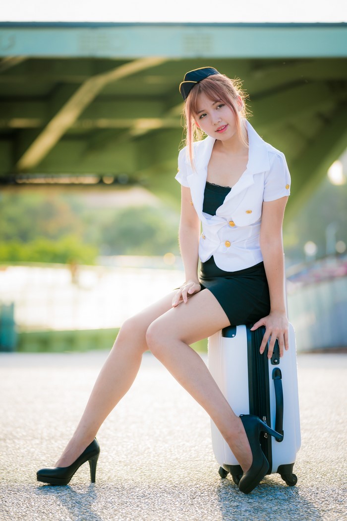 Asian Pose Sitting Suitcase Stilettos Legs Beautiful Skirt