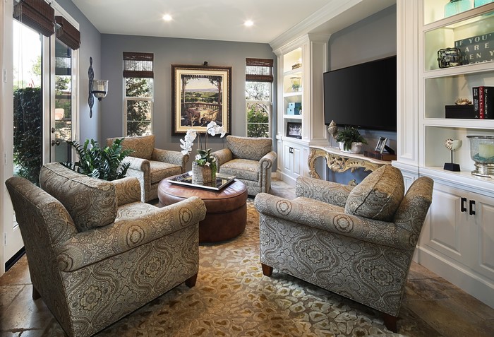 Living room with armchairs and ottoman