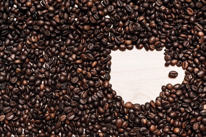 Coffee beans arranged in a heart shape