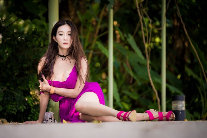 4K Asian Woman Sitting in Purple Dress