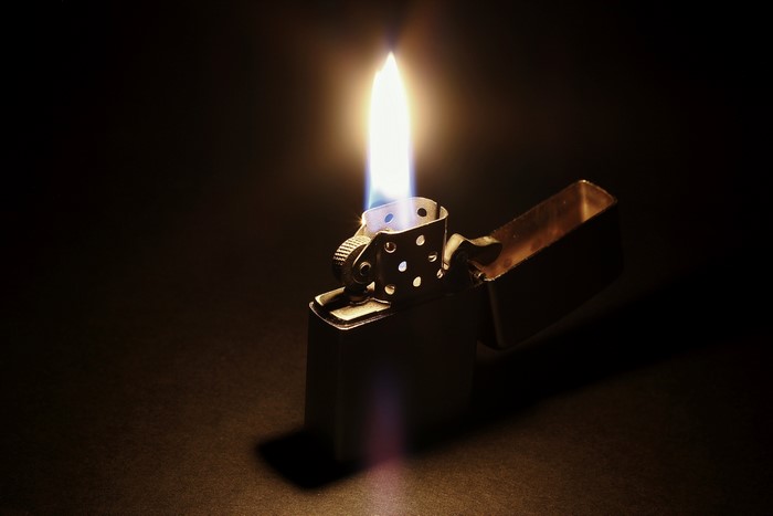 Zippo lighter with flame