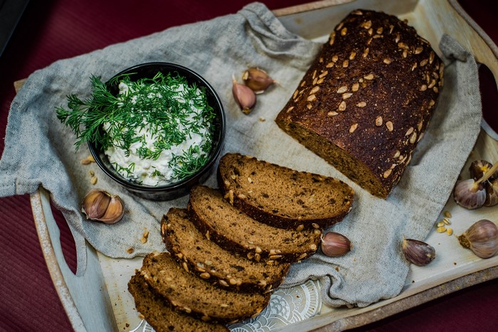 Bread, Dill Dip, and Garlic on a Tray