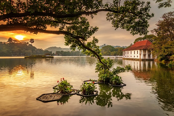 Kandy Lake at sunrise with Temple of the Tooth