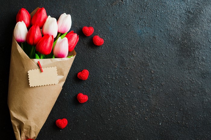 Bouquet of red and white tulips with hearts