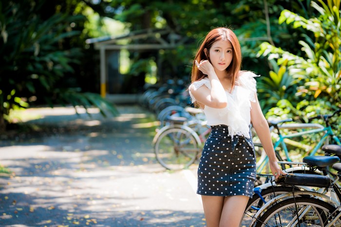 4K Asian Woman in Polka Dot Skirt Outdoors