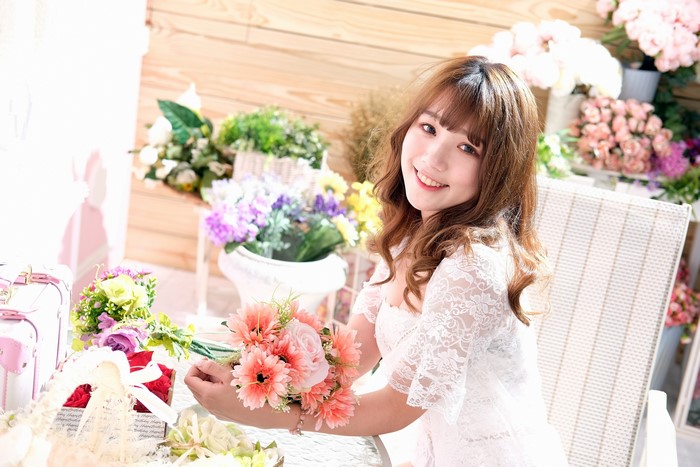 Cute Asian Woman with Bouquets