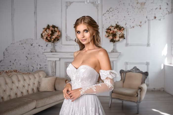 Bride in a white dress by Igor Kondukov