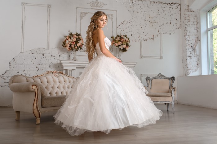 Bride in a white dress with a beautiful hairstyle