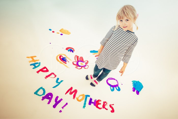 Girl painting Happy Mother's Day