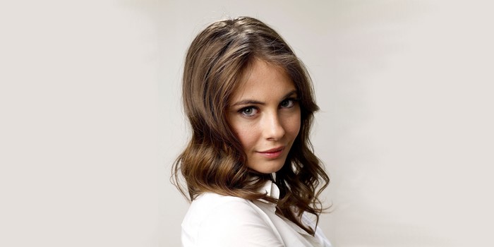 Willa Holland looking over her shoulder