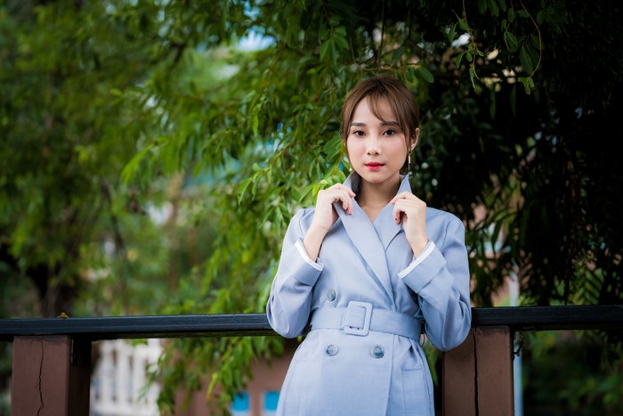 4K Asian Woman Wearing Stylish Coat Outdoors