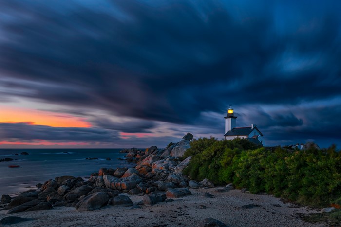 Lighthouse on the coast of Bretagne at sunset