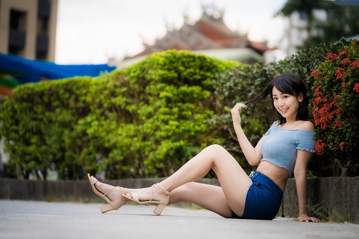 4K Asian Girl Sitting with Smile and Shorts