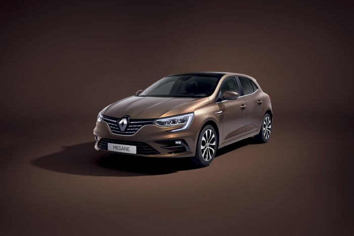 Renault Megane Sedan on a brown background
