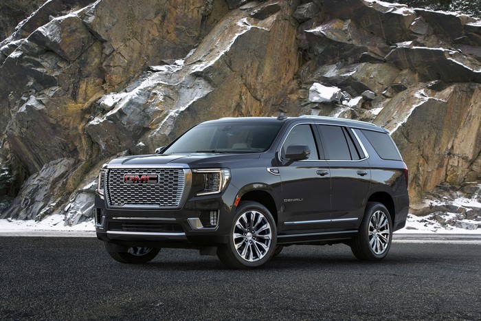 GMC Yukon Denali SUV on a rocky road