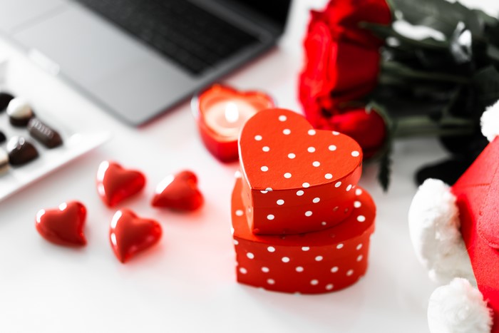 Valentine's Day gifts with laptop and roses