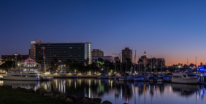 Shoreline Village Long Beach at Dusk with Boats