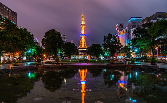 Sapporo TV Tower reflected in a pond at night