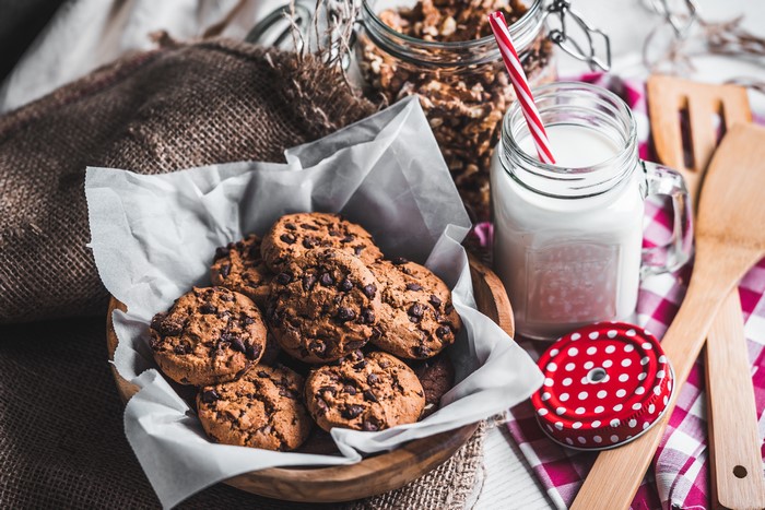 Chocolate chip cookies with milk and walnuts