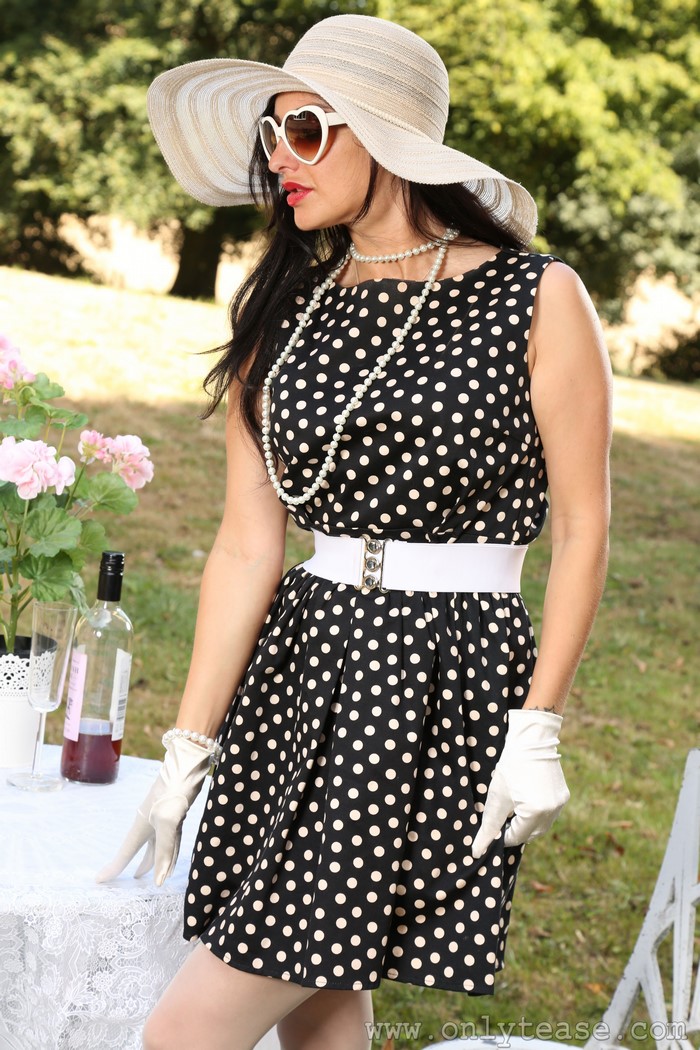 Cassie Clarke in Polka Dot Dress and Sun Hat