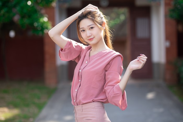 4K Asian Woman in Pink Blouse Outdoors