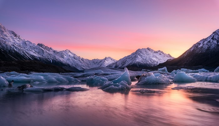 4K Lake Tasman New Zealand Icebergs at Sunset