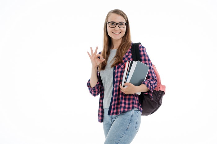 Student with Glasses and Backpack Making OK Gesture