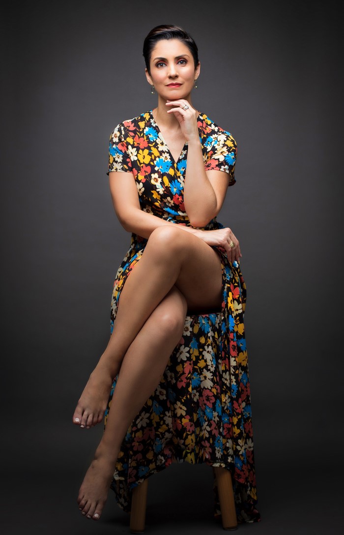 Karla Sitting Gracefully in Floral Dress