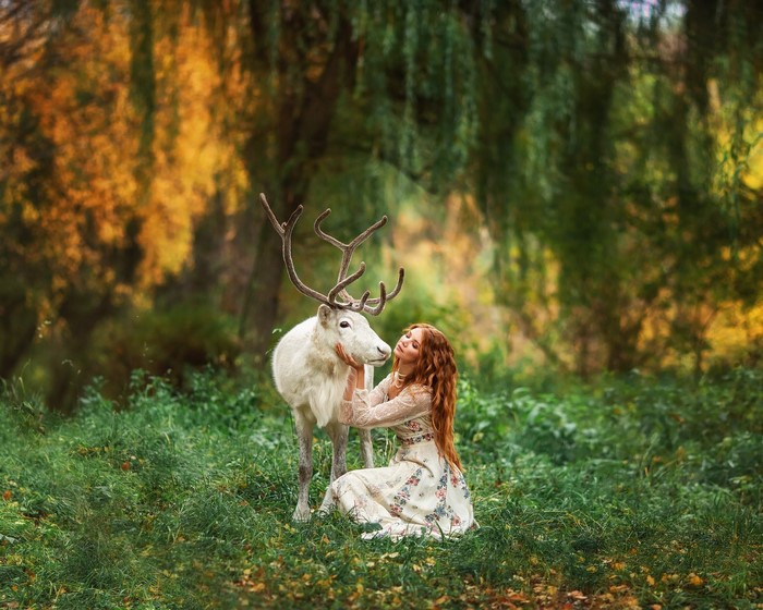 Anastasia Barmina with a white deer
