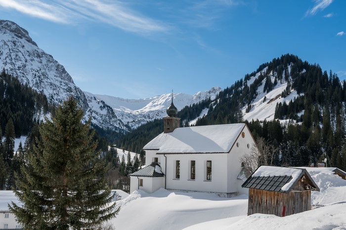 Winter scene with church in Austrian Alps