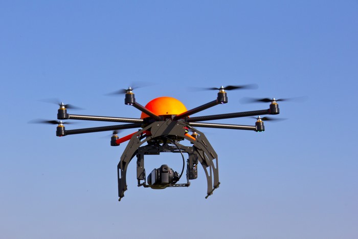 Drone with camera flying in the sky