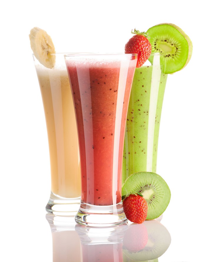 Three Smoothies with Fruits on White Background