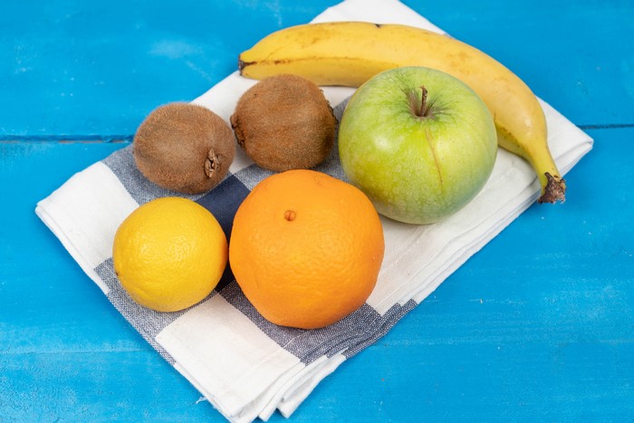 Assorted Fruits on a Blue Wooden Table