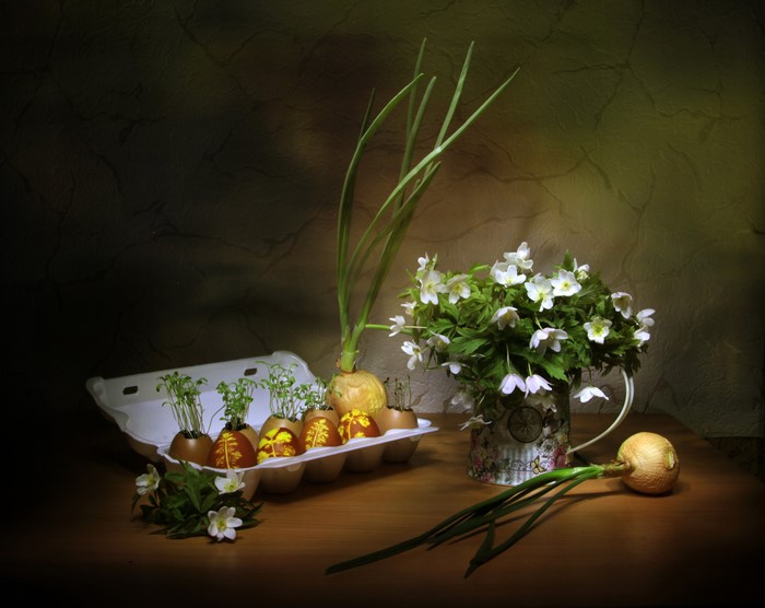 Easter still-life with eggs, onions, and anemones