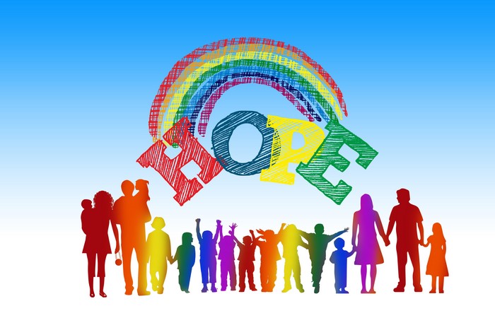 Hope word with rainbow and family silhouettes