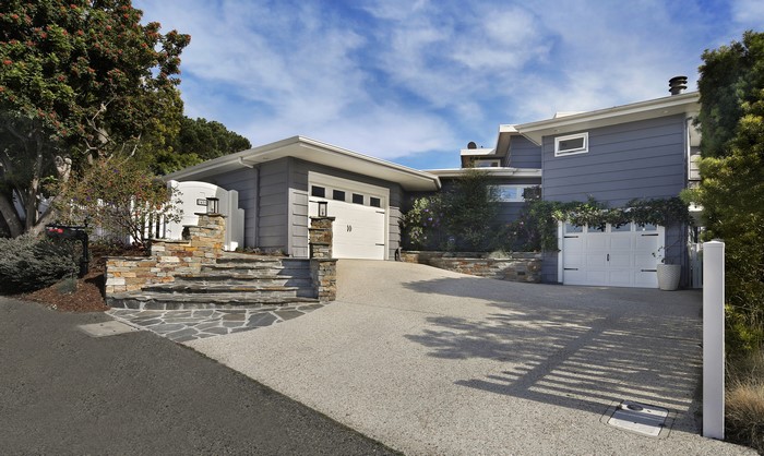 Modern house with garage and stone stairs in Laguna Beach, USA