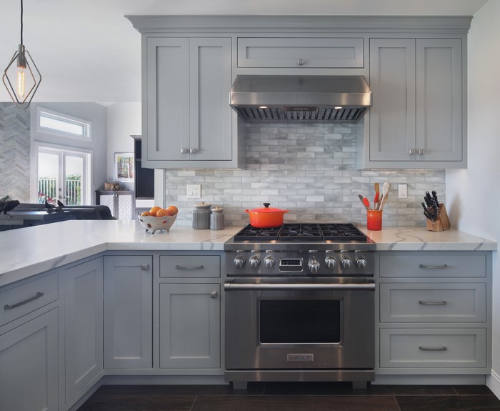 Modern gray kitchen with stainless steel appliances