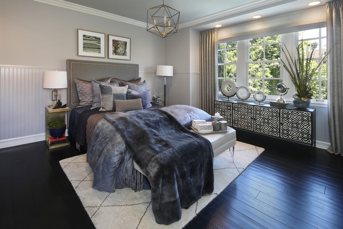 Modern Bedroom with Gray Bedding and Geometric Cabinet