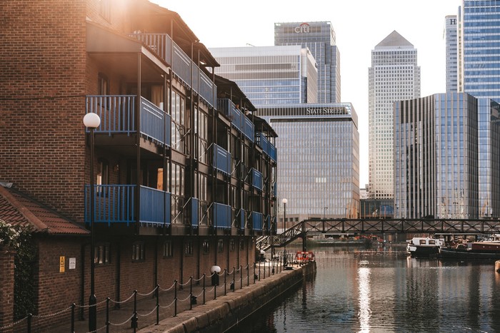 Apartment building and skyscrapers by river in London