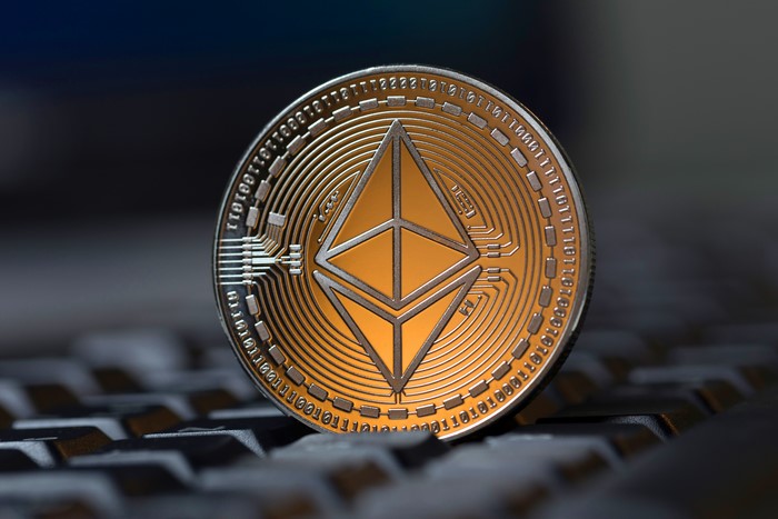 Ethereum coin on a keyboard