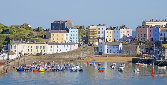 Tenby harbour with colorful houses and boats in Wales