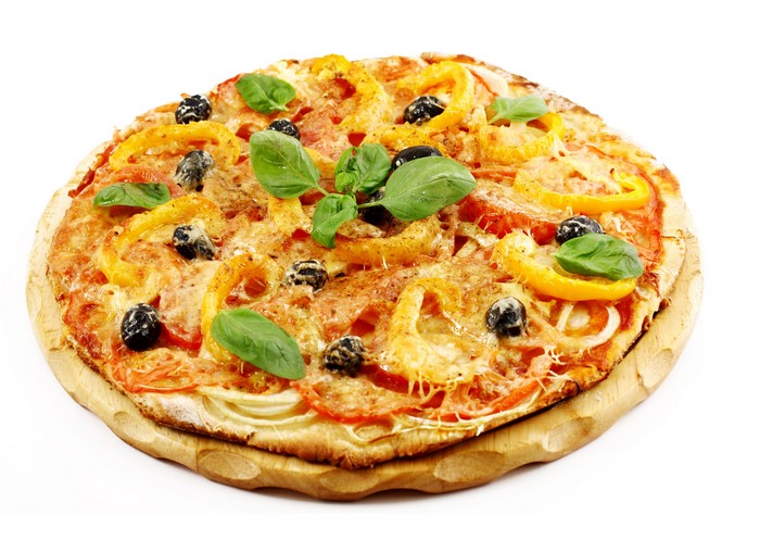 Pizza with tomatoes, olives, bell peppers, and basil