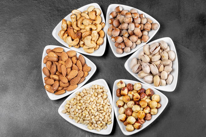 Assortment of Nuts in White Bowls