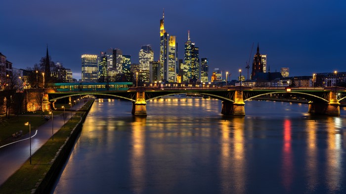 Frankfurt skyline and Main river at night
