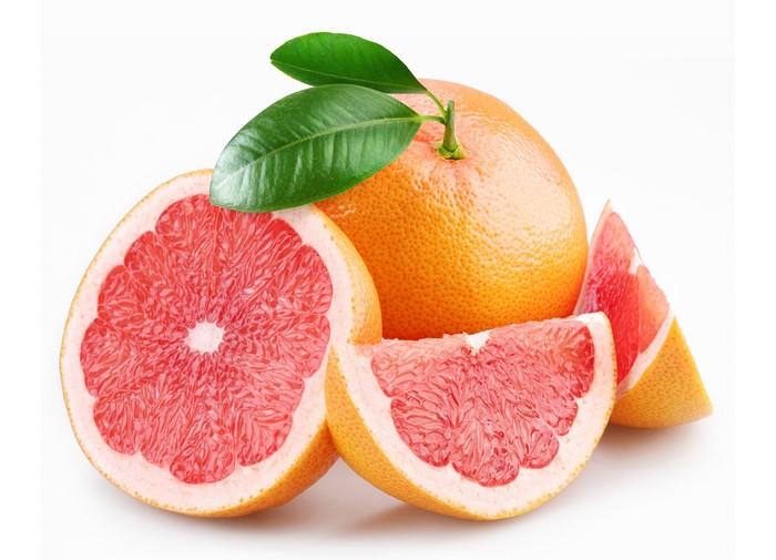 Grapefruit with leaves and slices