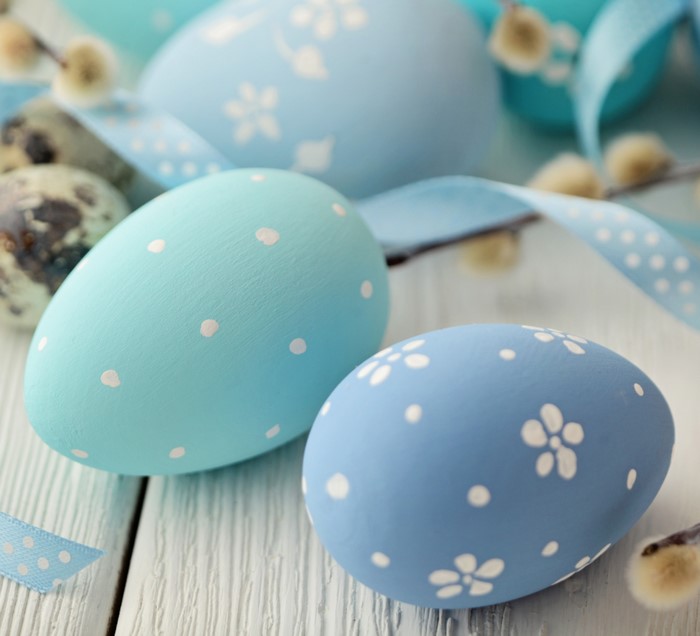 Easter eggs with pussy willows and ribbon